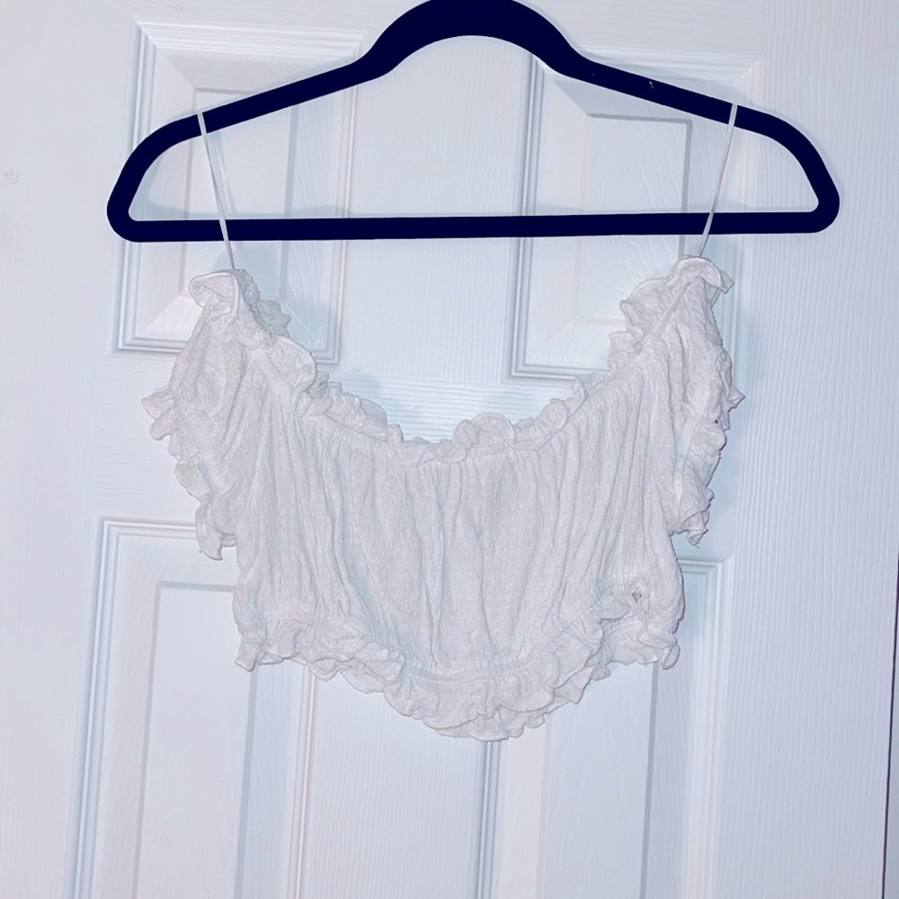 Cropped, off-the-shoulder shirt. Size small.